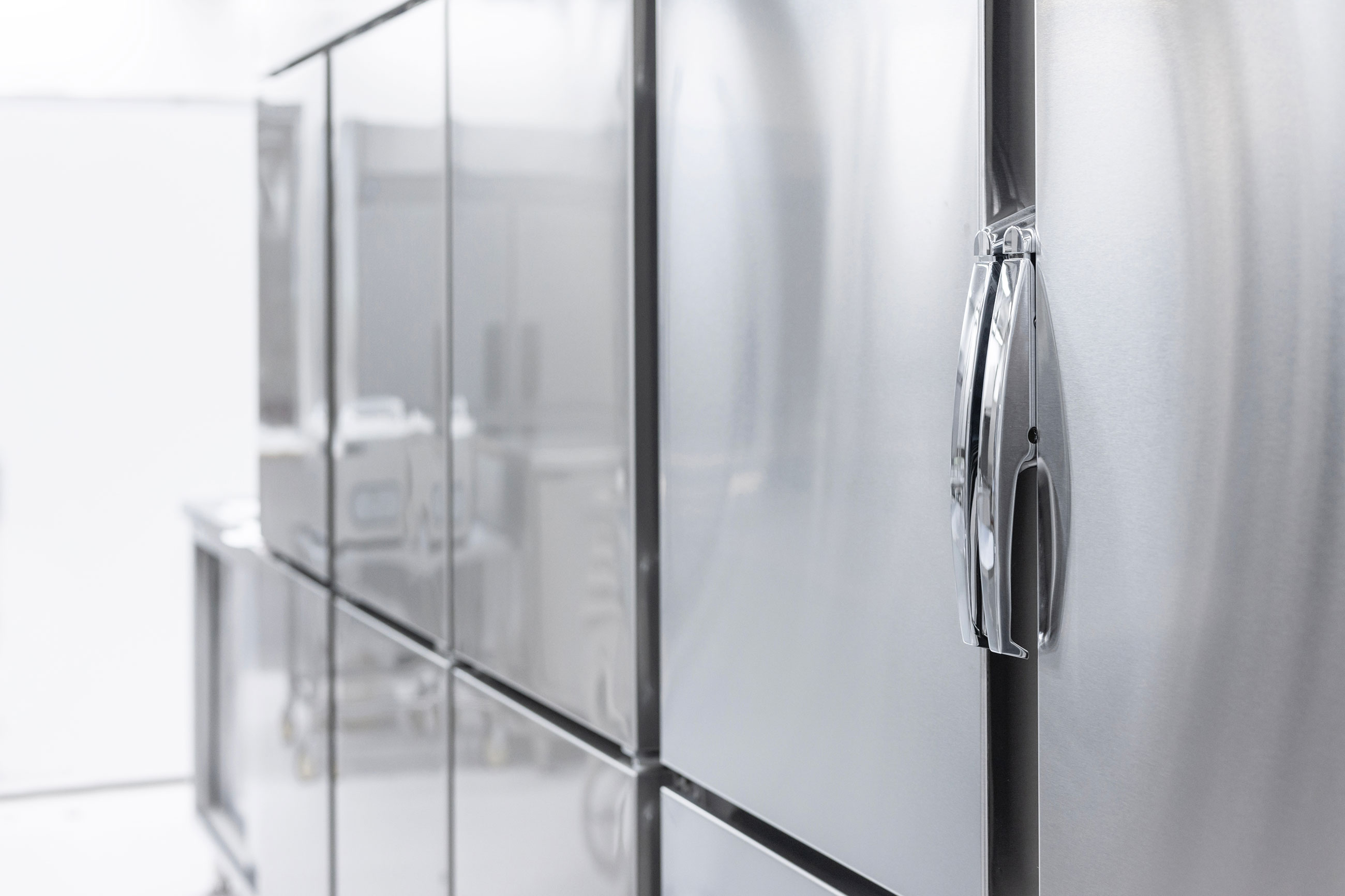 Polished stainless cookware and rebuilt commercial kitchen equipment